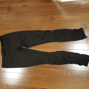 Black Ivivva leggings with super cute rutched calves